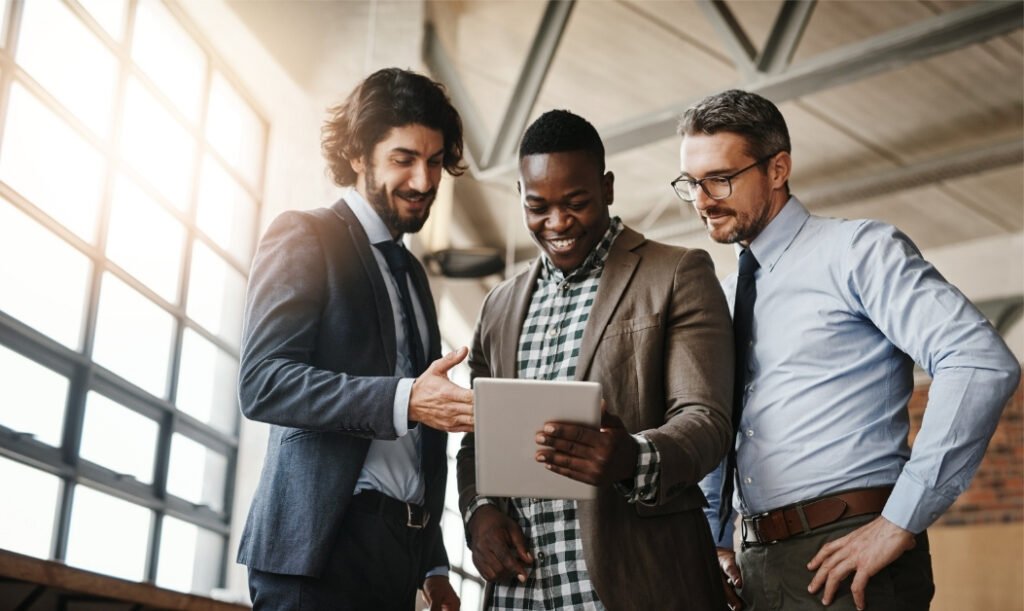 Real estate agents discuss new jersey retail space for sale with a client.